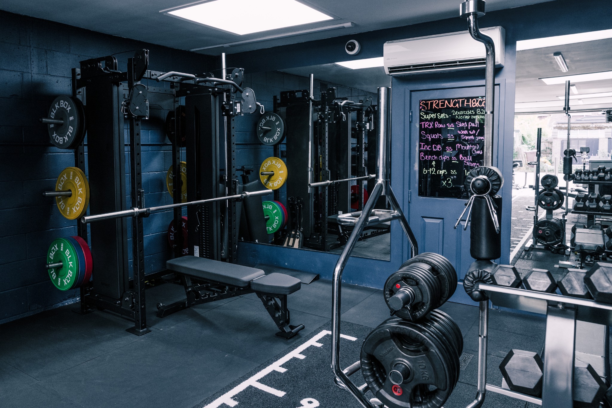Free weights and strength equipment in the studio